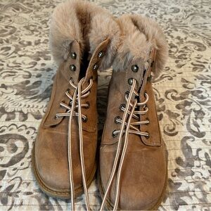Brown furry booties. Be safe while looking fashionable. Almost new. Worn 2x.